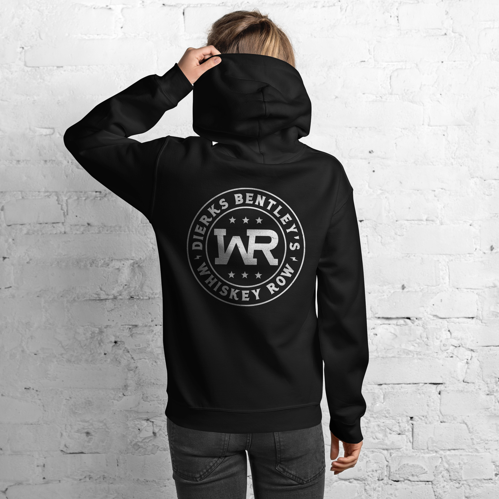 person wearing Whiskey Row Black Hoodie back view